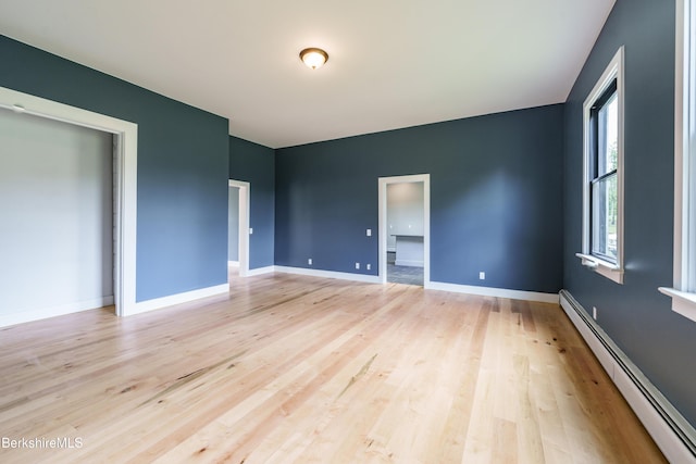 138 Ridge Rd, Worthington, MA 01098 - unfurnished room featuring baseboard heating and light wood-style floors