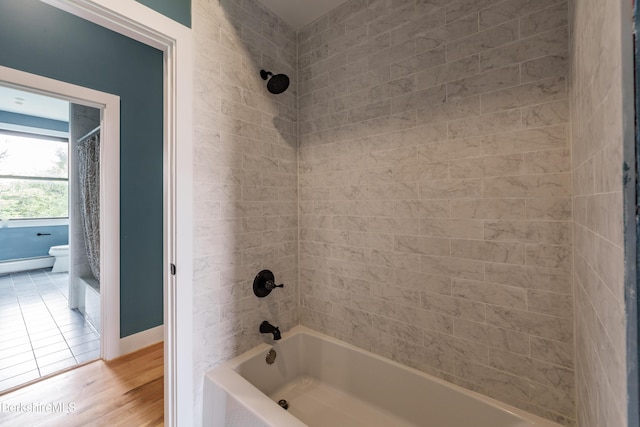 138 Ridge Rd, Worthington, MA 01098 - full bath with bathing tub / shower combination and wood finished floors