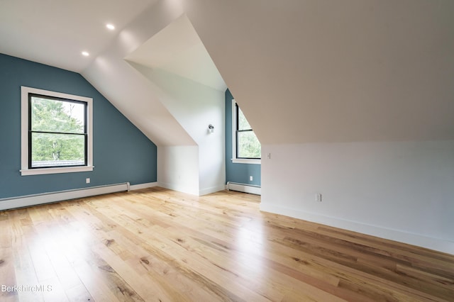138 Ridge Rd, Worthington, MA 01098 - additional living space with baseboard heating, vaulted ceiling, light wood-style flooring, and recessed lighting