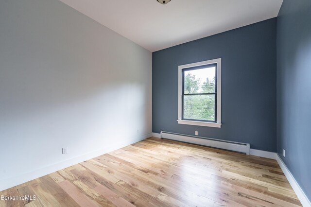 138 Ridge Rd, Worthington, MA 01098 - unfurnished room featuring baseboard heating and light wood finished floors