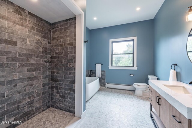 138 Ridge Rd, Worthington, MA 01098 - bathroom featuring a baseboard heating unit, vanity, a freestanding bath, recessed lighting, and a shower