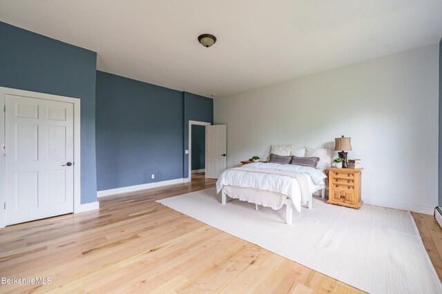 138 Ridge Rd, Worthington, MA 01098 - bedroom with wood finished floors and baseboards
