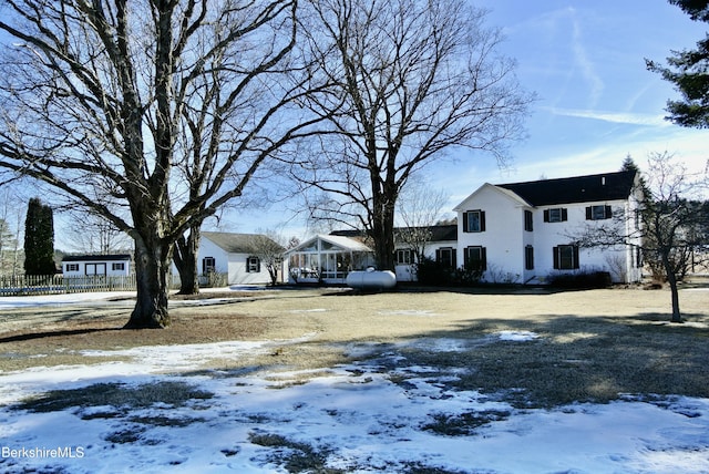 view of yard layered in snow