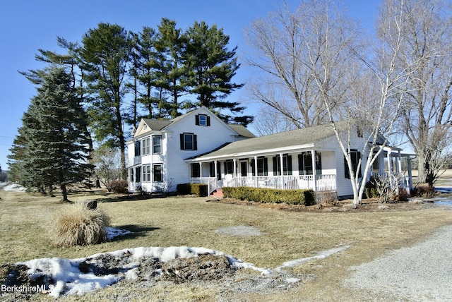 exterior space with a front lawn and covered porch