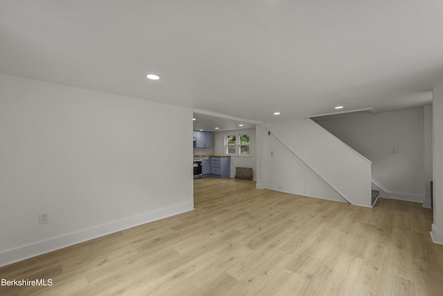 102 Pontoosuc Ave, Pittsfield, MA 01201 - unfurnished living room with recessed lighting, stairs, and light wood-style flooring