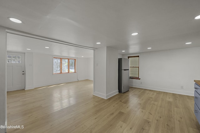 102 Pontoosuc Ave, Pittsfield, MA 01201 - unfurnished living room with plenty of natural light, light wood-style floors, and recessed lighting