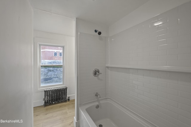 102 Pontoosuc Ave, Pittsfield, MA 01201 - full bathroom with radiator heating unit, shower / bath combination, and wood finished floors