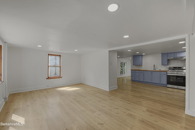 102 Pontoosuc Ave, Pittsfield, MA 01201 - unfurnished living room with recessed lighting and light wood-style floors
