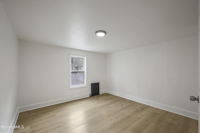 102 Pontoosuc Ave, Pittsfield, MA 01201 - empty room featuring radiator heating unit and light wood-style floors