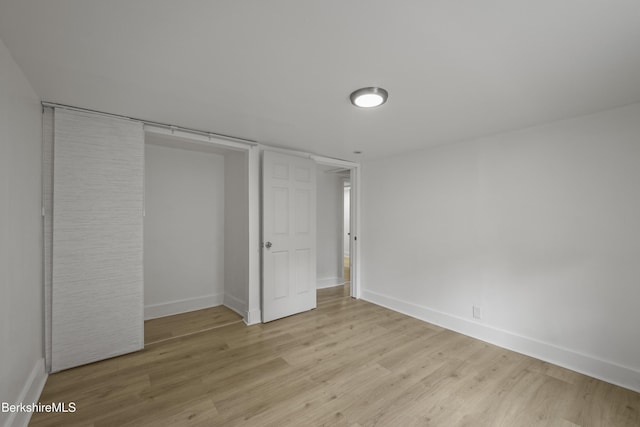 102 Pontoosuc Ave, Pittsfield, MA 01201 - unfurnished bedroom with wood finished floors and a closet