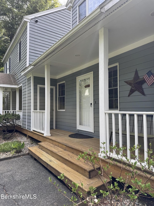 9122 Mountainside Dr, Hancock, MA 01237 - doorway to property featuring a porch