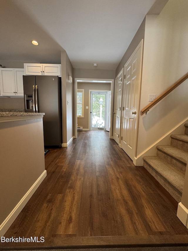 entrance foyer with dark wood-type flooring