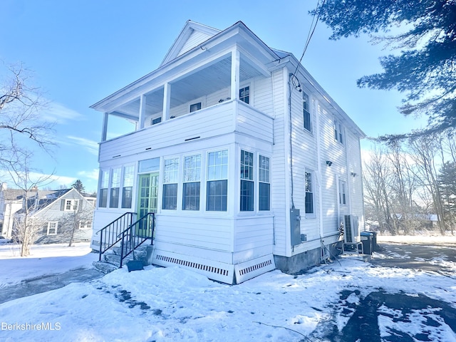 view of front of home with a balcony