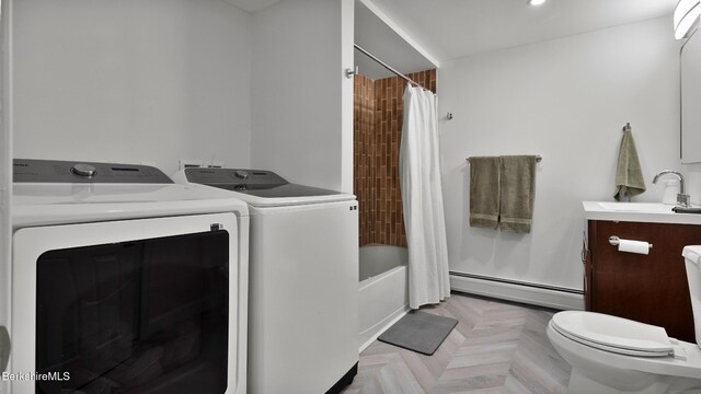 207 S Mountain Rd, Pittsfield, MA 01201 - laundry room featuring washing machine and dryer and baseboard heating