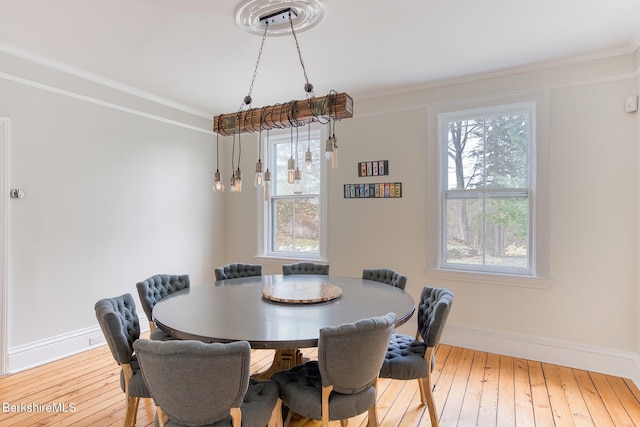 21 Stockbridge Rd, West Stockbridge, MA 01266 - dining space featuring crown molding, baseboards, plenty of natural light, and hardwood / wood-style floors