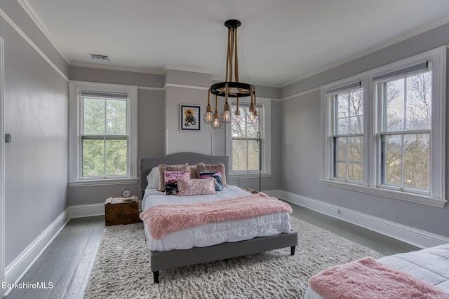 21 Stockbridge Rd, West Stockbridge, MA 01266 - bedroom with multiple windows, wood finished floors, baseboards, ornamental molding, and a chandelier