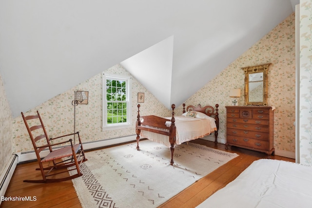 28 Main Rd, Tyringham, MA 01264 - bedroom with hardwood / wood-style flooring, wallpapered walls, lofted ceiling, and a baseboard radiator