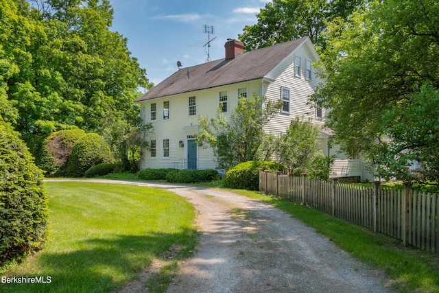 28 Main Rd, Tyringham, MA 01264 - view of front facade with a chimney, driveway, and a shingled roof