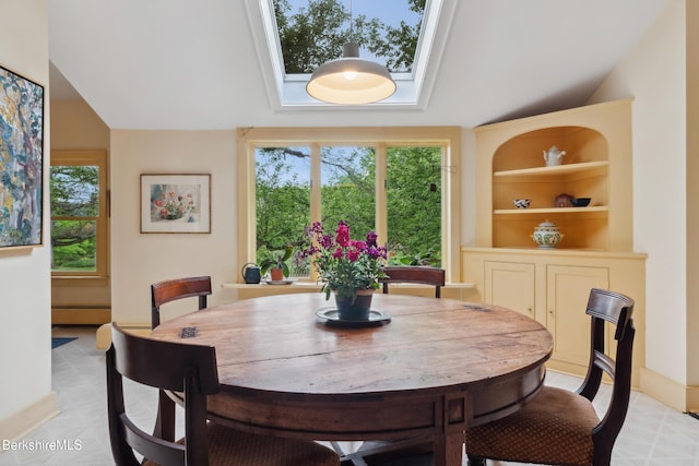 28 Main Rd, Tyringham, MA 01264 - dining area featuring baseboard heating, plenty of natural light, and built in shelves