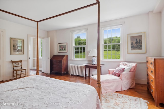 28 Main Rd, Tyringham, MA 01264 - bedroom featuring radiator and wood finished floors
