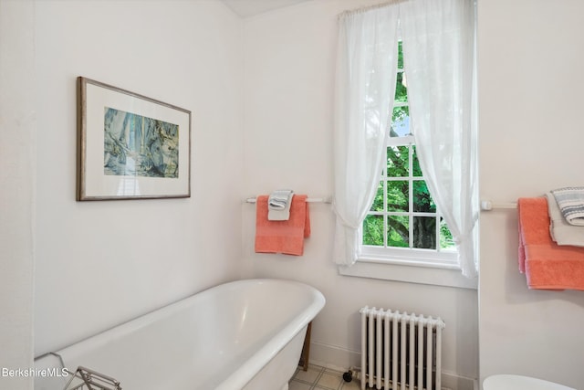 28 Main Rd, Tyringham, MA 01264 - full bath with radiator heating unit and a soaking tub