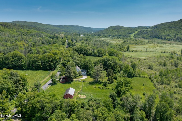 28 Main Rd, Tyringham, MA 01264 - aerial view of property and surrounding area featuring a forest and a mountain backdrop