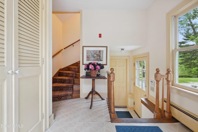 28 Main Rd, Tyringham, MA 01264 - foyer entrance featuring a baseboard heating unit and stairs