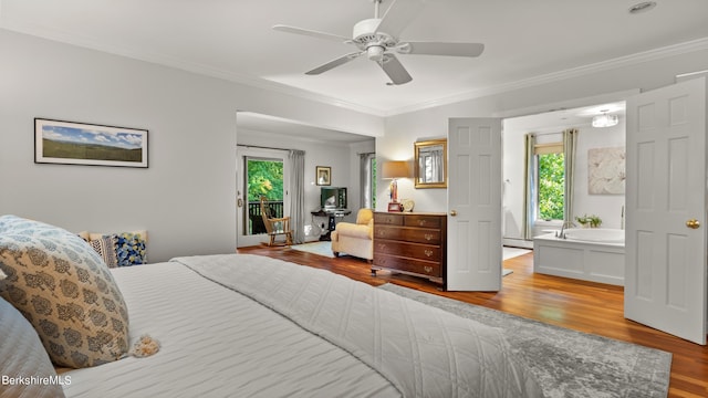 bedroom with ceiling fan, light wood-type flooring, and crown molding