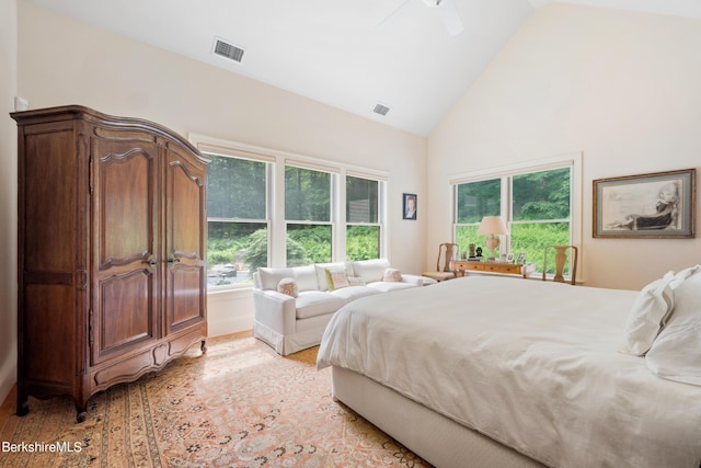 bedroom with high vaulted ceiling and ceiling fan