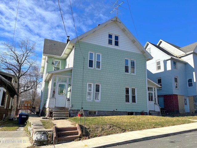 exterior space with a front yard