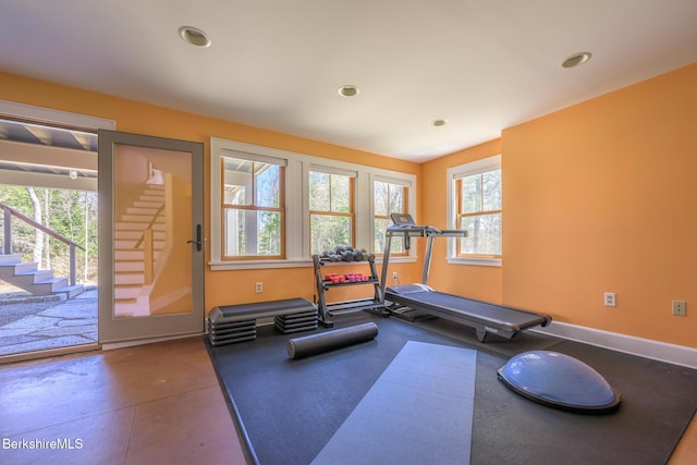 workout area featuring baseboards and recessed lighting