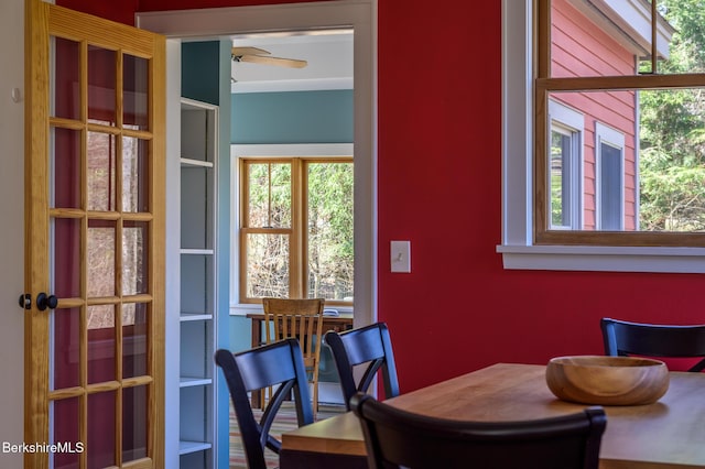 interior space featuring ceiling fan