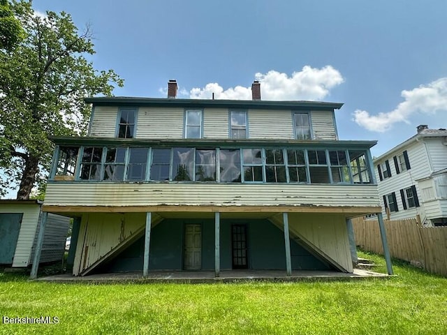 27-29 Daniels Ave, Pittsfield, MA 01201 - rear view of property featuring a sunroom, a chimney, and stairs