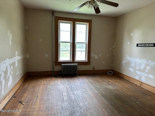 27-29 Daniels Ave, Pittsfield, MA 01201 - empty room with radiator, ceiling fan, and wood finished floors