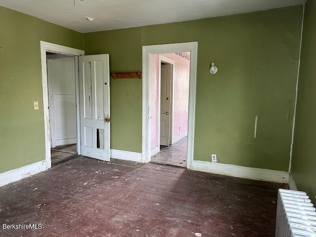 27-29 Daniels Ave, Pittsfield, MA 01201 - unfurnished bedroom with baseboards and radiator heating unit