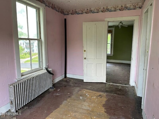 27-29 Daniels Ave, Pittsfield, MA 01201 - empty room featuring radiator and baseboards