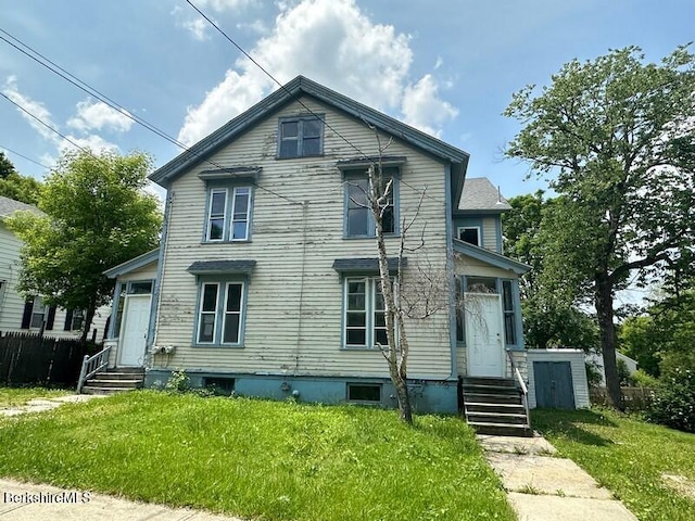 27-29 Daniels Ave, Pittsfield, MA 01201 - traditional-style home with entry steps and a front lawn