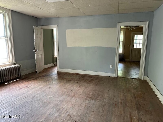 27-29 Daniels Ave, Pittsfield, MA 01201 - spare room with radiator heating unit, wood finished floors, and a ceiling fan