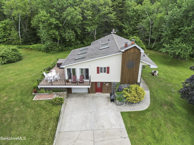 4 Birch Hill Rd, Peru, MA 01235 - view of front of property featuring a deck, driveway, a front yard, a shingled roof, and a wooded view