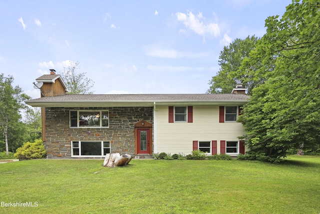 4 Birch Hill Rd, Peru, MA 01235 - raised ranch featuring a chimney, a front lawn, stone siding, and a shingled roof