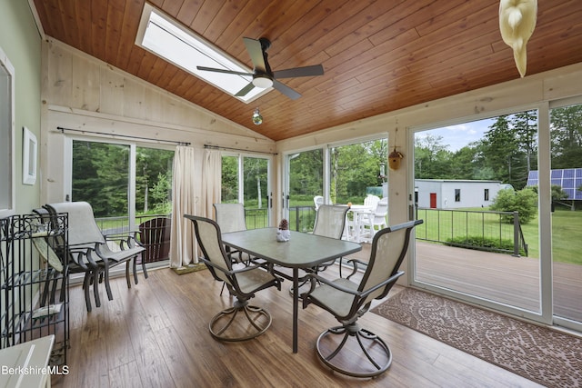 4 Birch Hill Rd, Peru, MA 01235 - sunroom featuring outdoor dining area, lofted ceiling, a skylight, ceiling fan, and a wooden deck