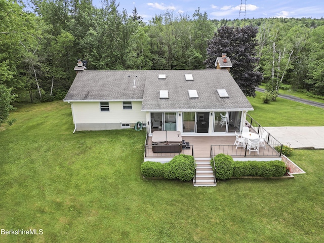 4 Birch Hill Rd, Peru, MA 01235 - rear view of house featuring a chimney, stairs, a lawn, and a wooded view