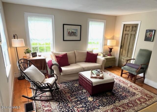 132 Sandisfield Rd, Sandisfield, MA 01255 - living room with wood finished floors and baseboards