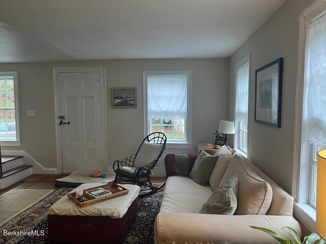 132 Sandisfield Rd, Sandisfield, MA 01255 - living room featuring baseboards and wood finished floors