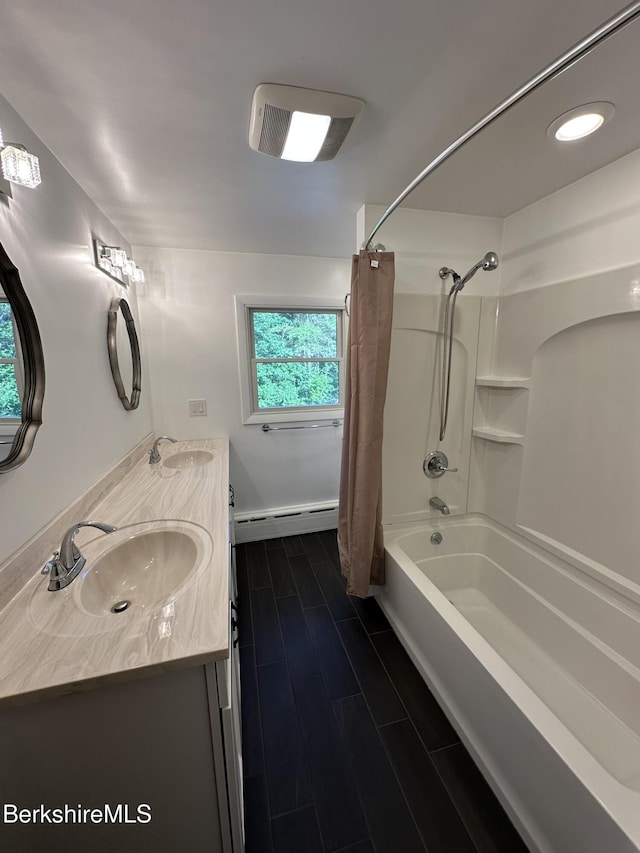 31 Autumn Dr, North Adams, MA 01247 - bathroom with a baseboard heating unit, shower / tub combo, and double vanity