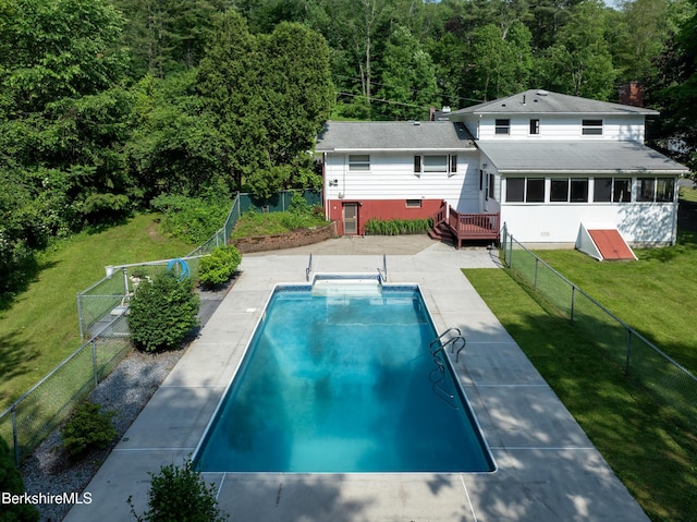 31 Autumn Dr, North Adams, MA 01247 - back of property with a deck, a fenced backyard, and a forest view
