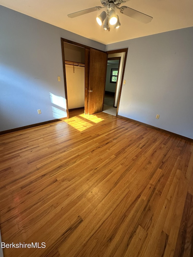 31 Autumn Dr, North Adams, MA 01247 - unfurnished bedroom featuring a closet, wood finished floors, and a ceiling fan