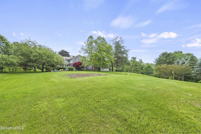 135 E St, Lee, MA 01238 - view of green lawn with view of wooded area