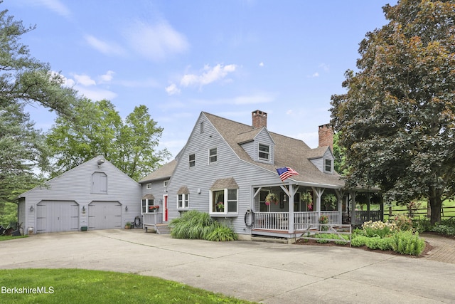 135 E St, Lee, MA 01238 - cape cod home with a chimney, concrete driveway, a garage, an outdoor structure, and a shingled roof