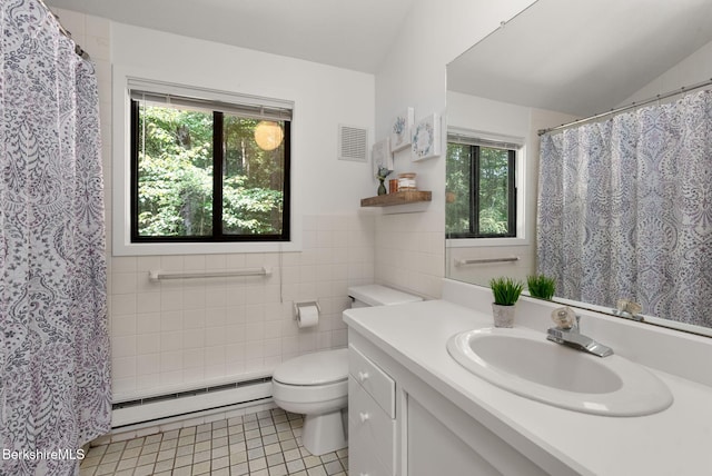 454 Seneca Dr, Becket, MA 01223 - full bathroom with baseboard heating, tile patterned flooring, vanity, tile walls, and a shower with shower curtain